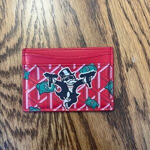 Red Card Holder with Cartoon Design